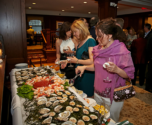 Guests enjoying raw bar